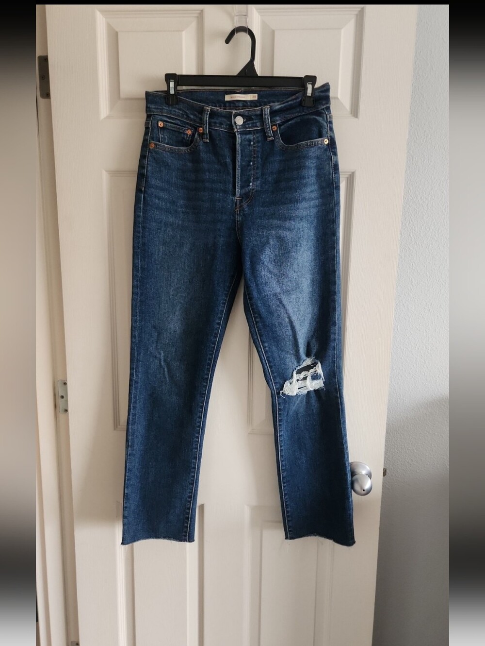 High-Rise Distressed Levi's Jeans